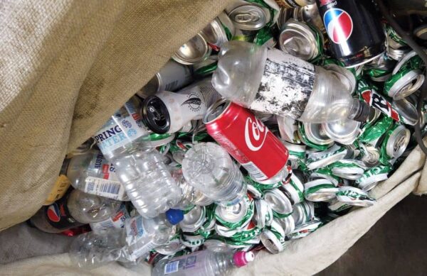 Empty cans and plastic bottles for recycling.
