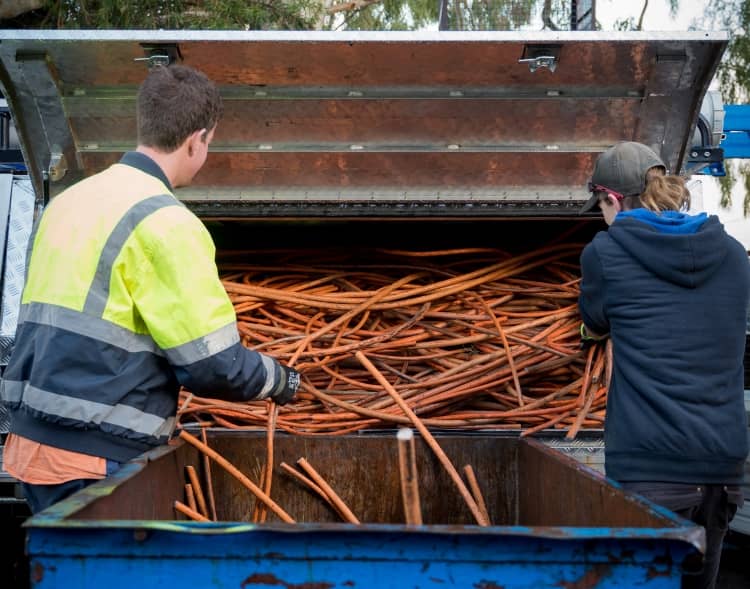 Scrap yards use a number of different means to sort and separate metal.